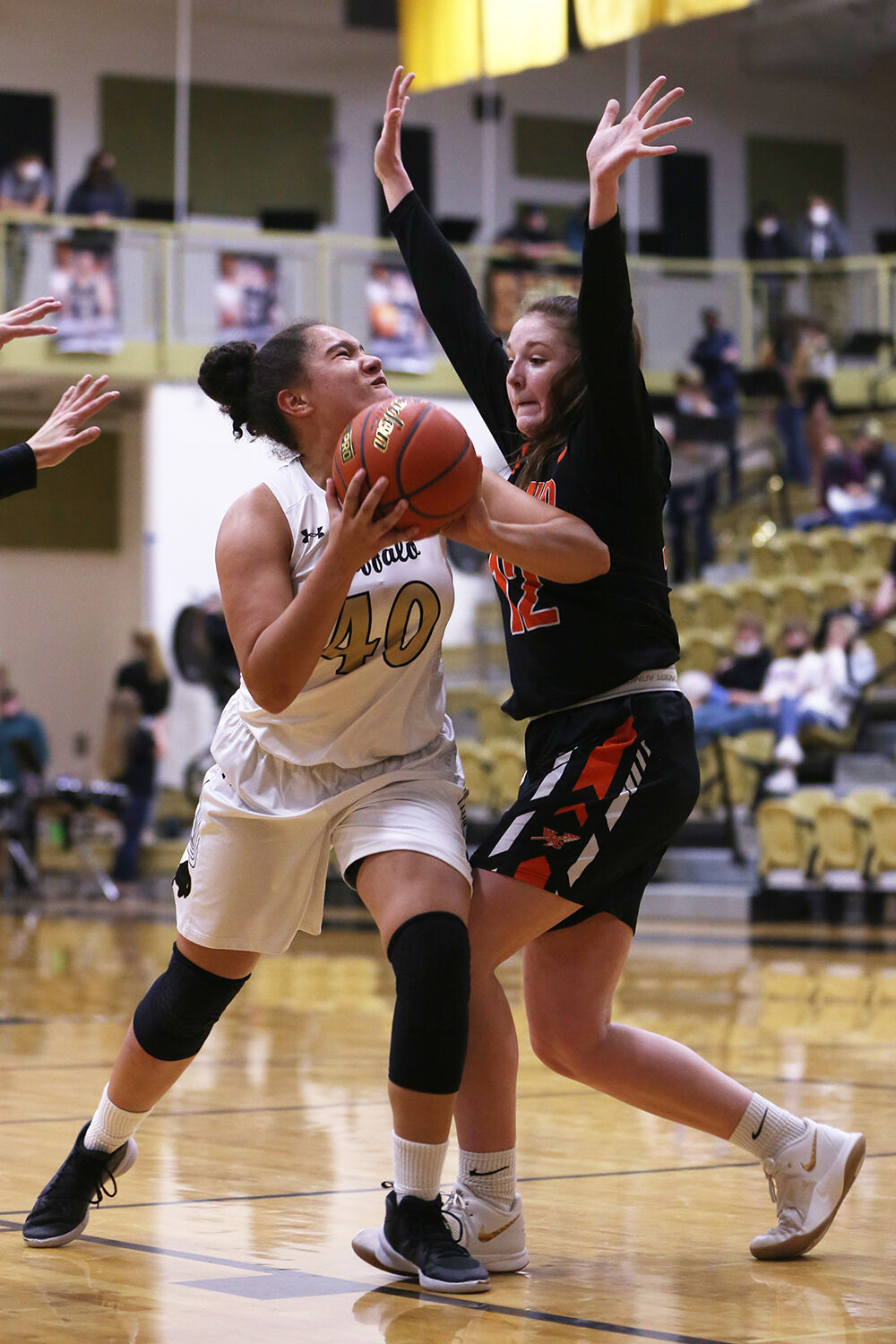 Danica Boyce drives through Worland senior Denali Jones